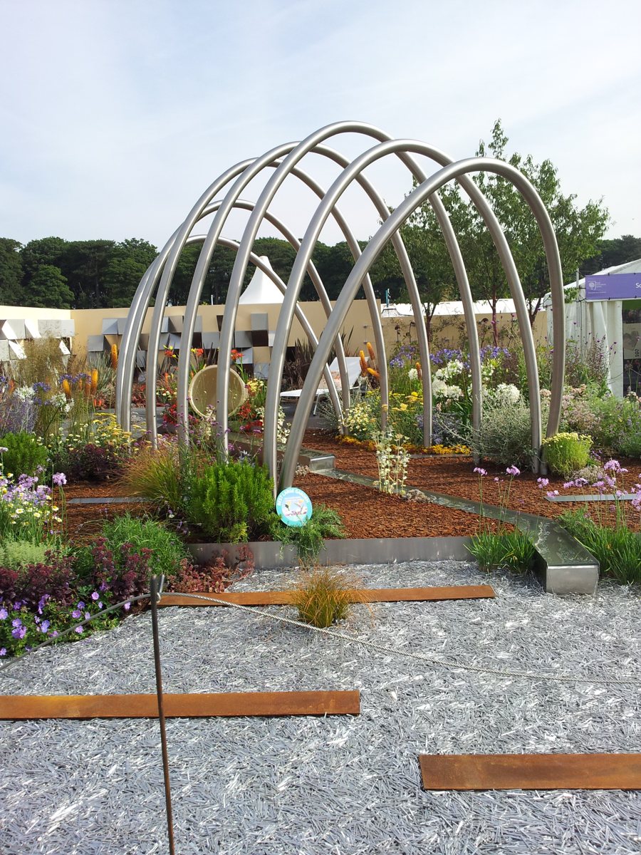 Stainless Steel Arch Pergola, Water Rills and Wall Panels - RHS Tatton Park Show Garden