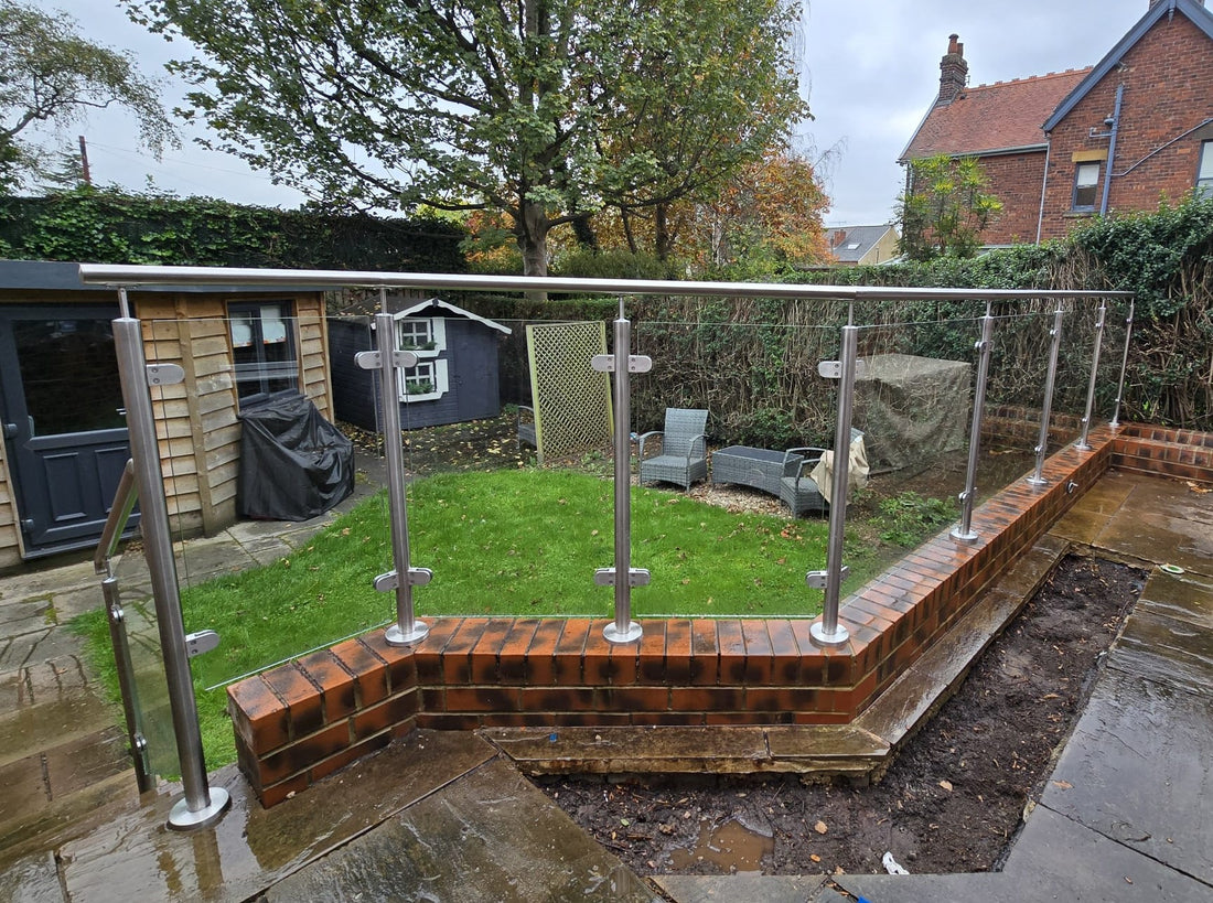 Glass Balustrade to a Raised Patio, with a Raked Glass Panel to the Steps - Dronfield