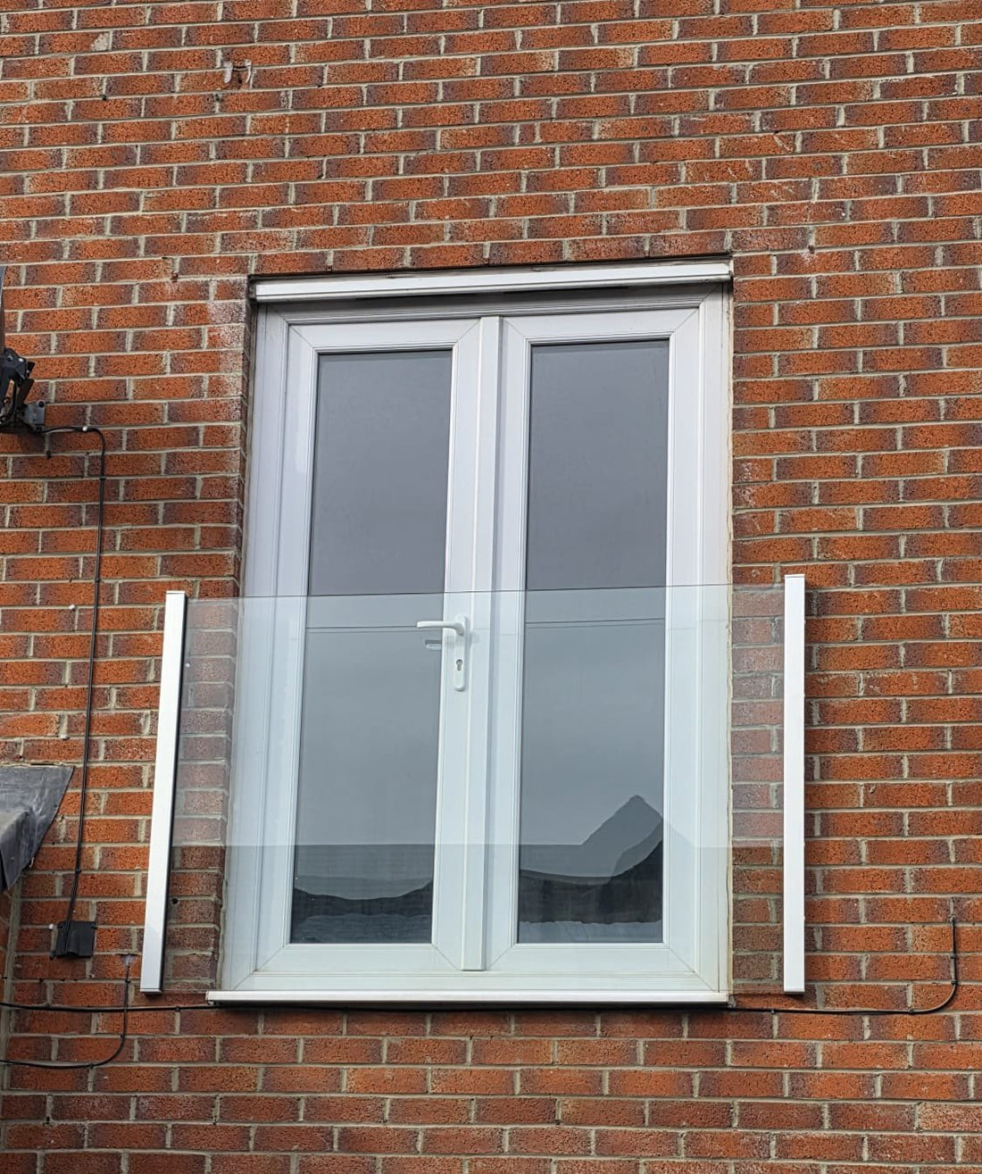 Canterbury frameless glass Juliet balcony on uPVC French doors, Stockton-on-Tees