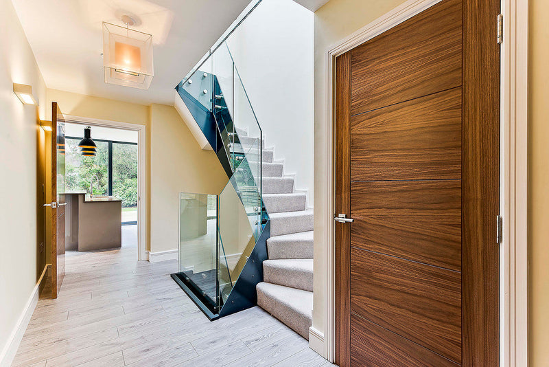 Frameless glass balustrade to an internal staircase