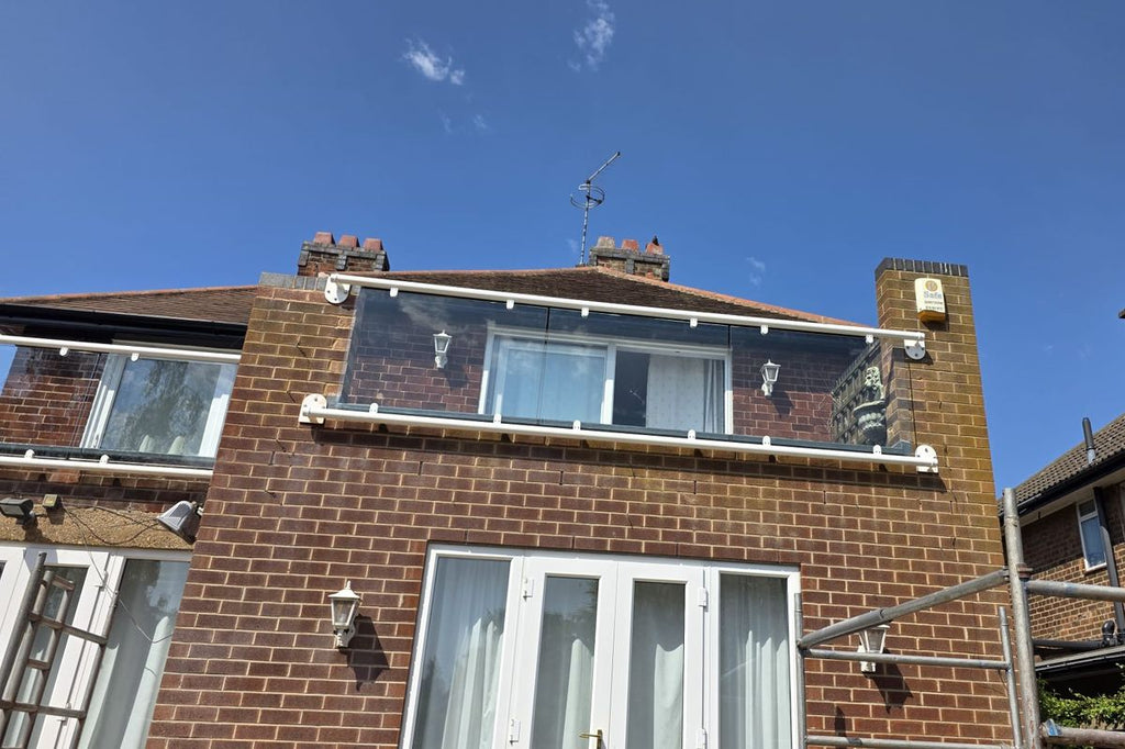 Bespoke glass Juliet balcony with a corner return, Nottingham