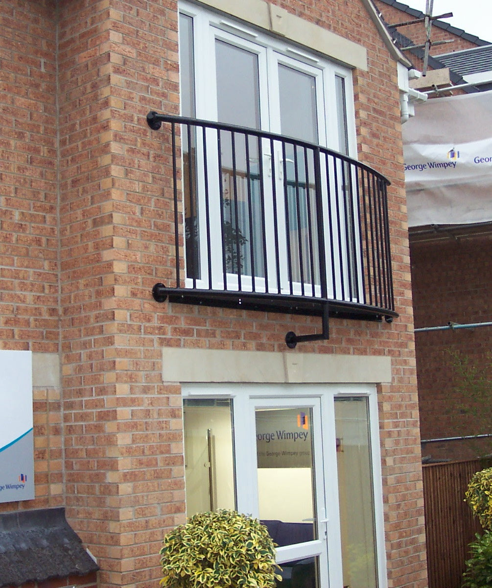 Curved Juliet balcony with steel mesh platform floor
