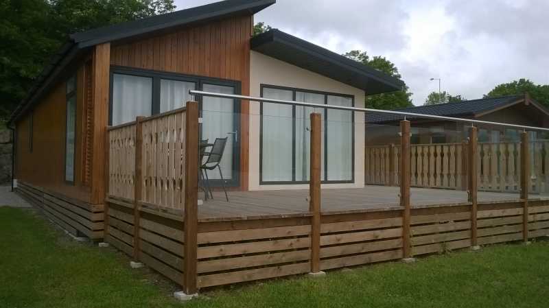Glass balustrade panels to caravan park decking