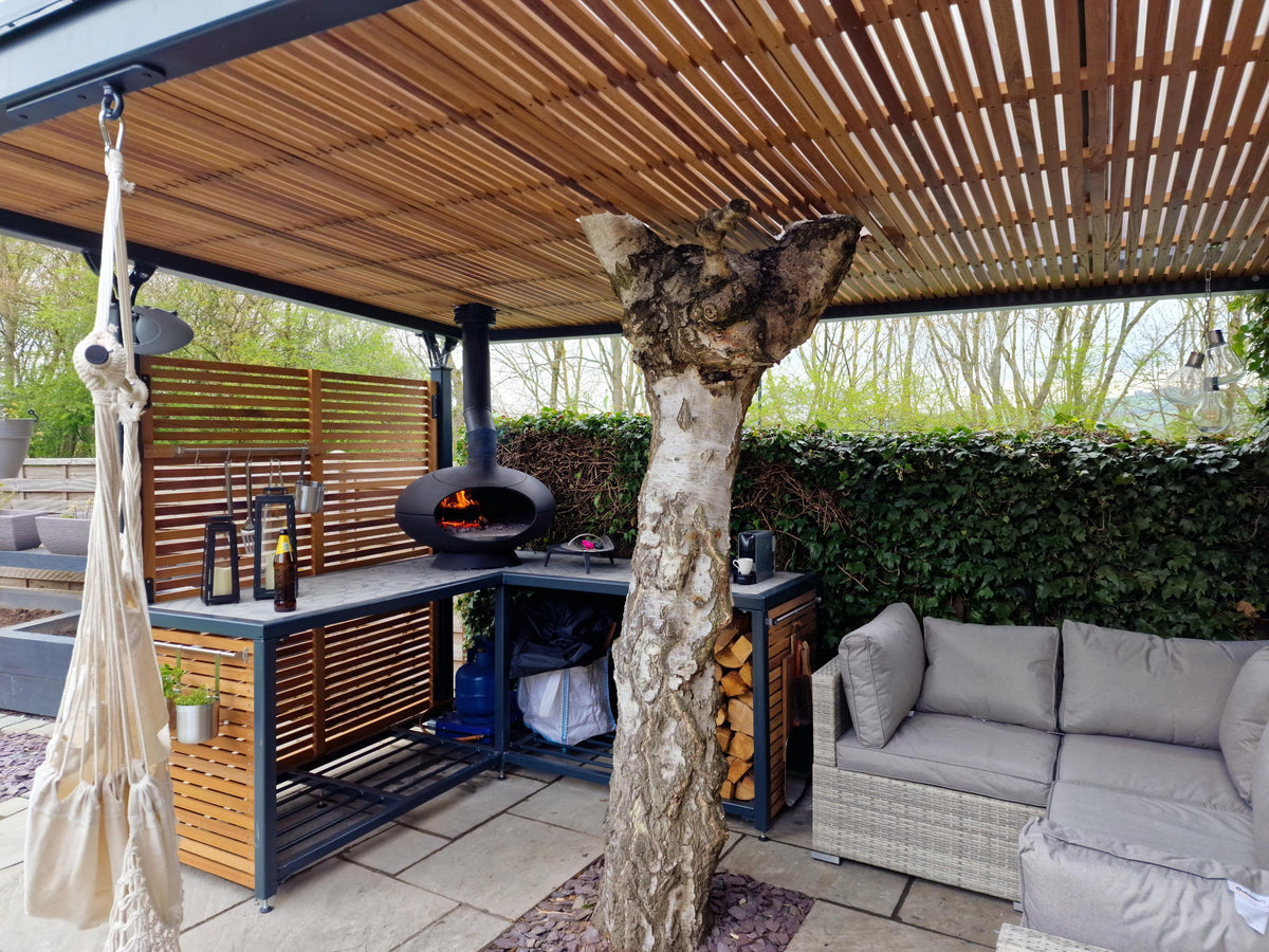 Custom steel pergola built around a mature tree