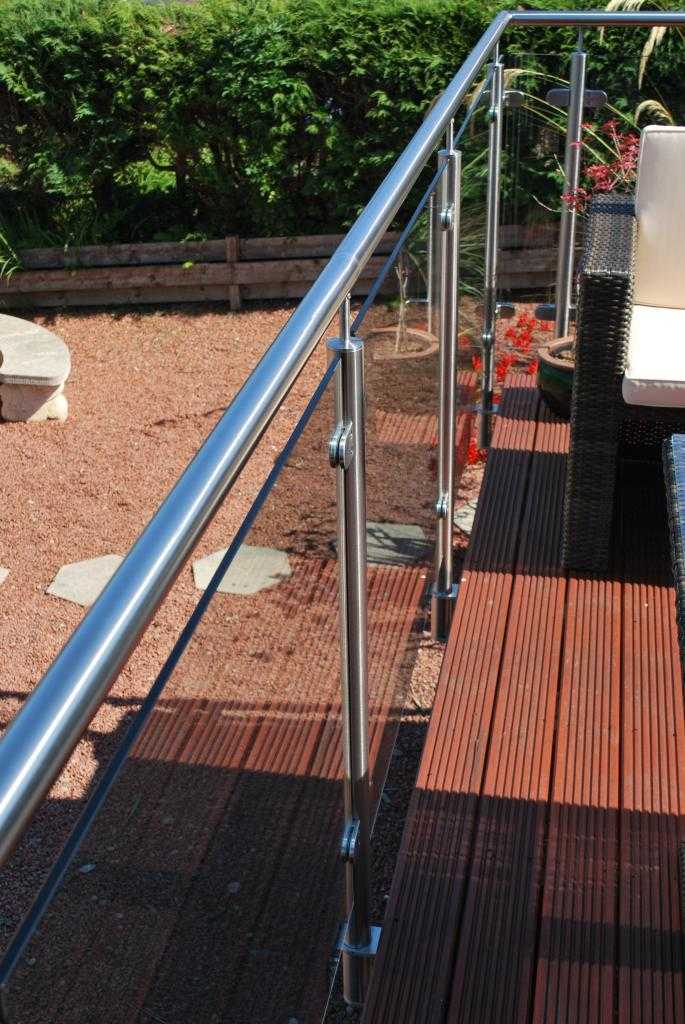 Long stainless steel handrail run joined with in-line connectors