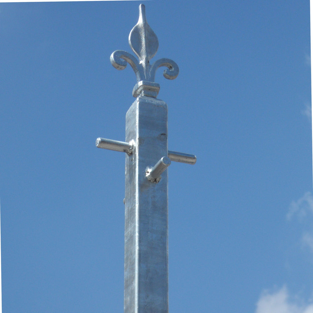 Fleur de lys clothes line pole showing the fleur railhead