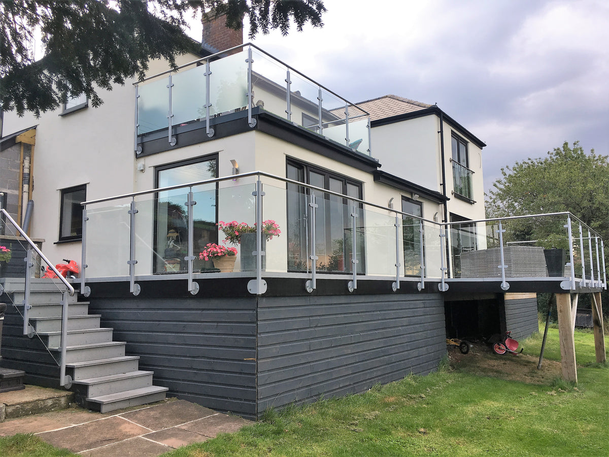 Powder coated glass balustrade to a balcony