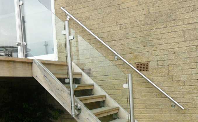 Stainless steel wall handrail on adjustable brackets