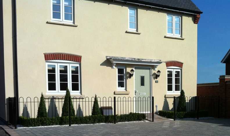 Hoop top railing panels between square posts