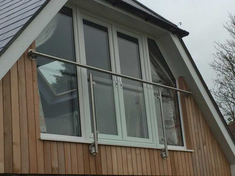 Stainless steel post and glass Juliet balcony