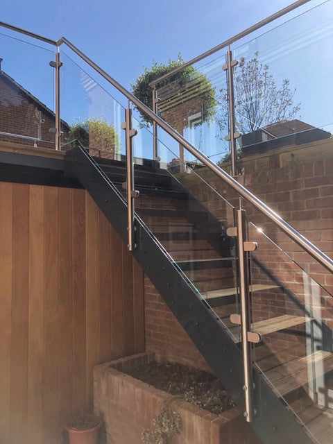 Powder coated garden staircase with stainless System 1 glass balustrade