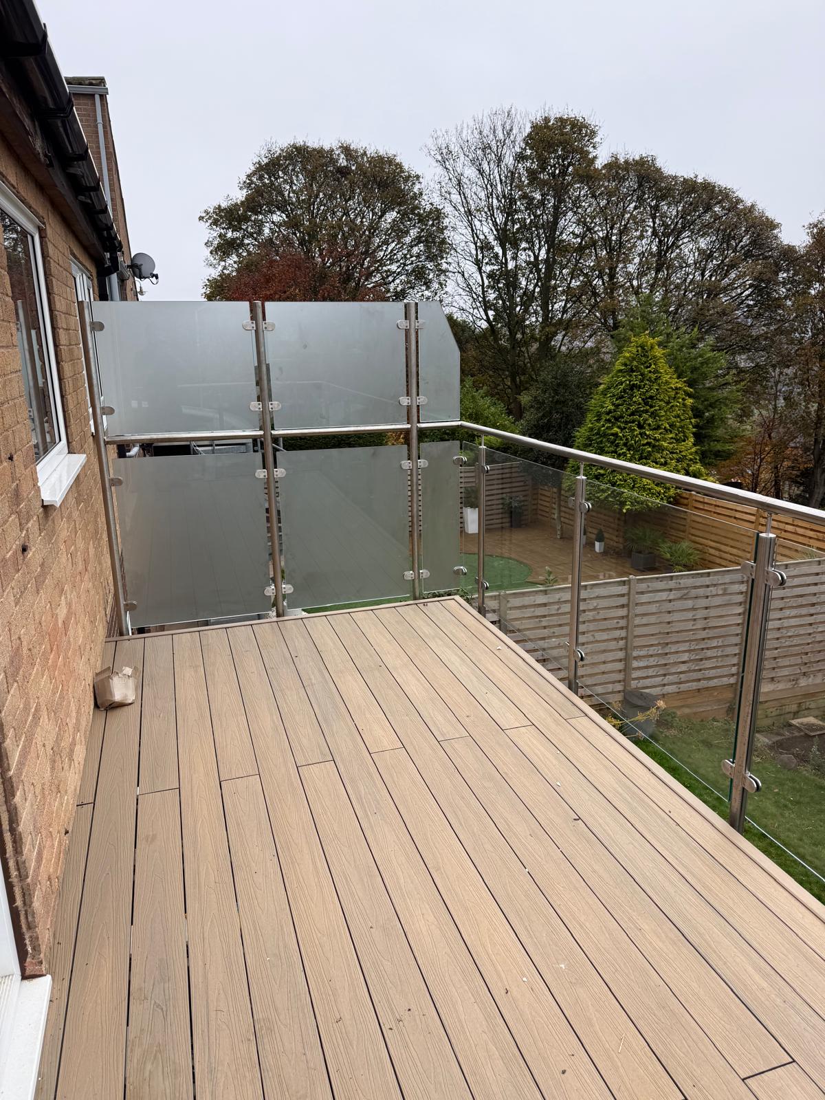 Walk-out balcony with a raised privacy screen to the side