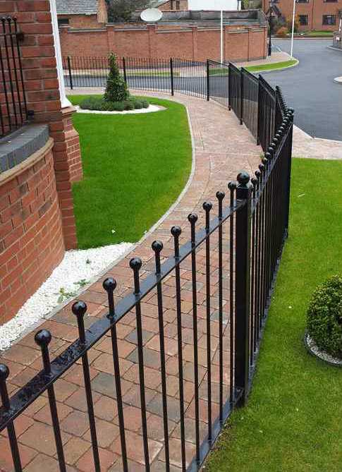Ball top steel railings to a front garden boundary