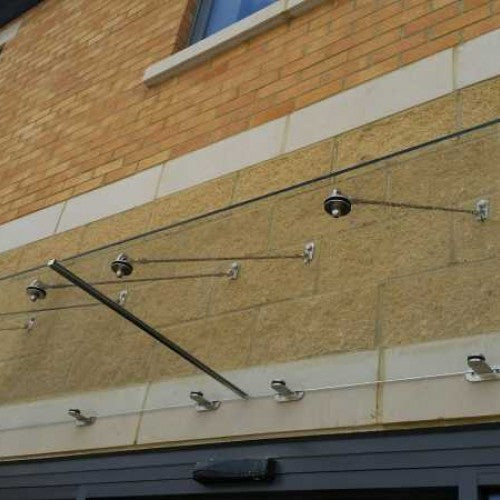Close up of the stainless steel glass clamp and tie-rod connection