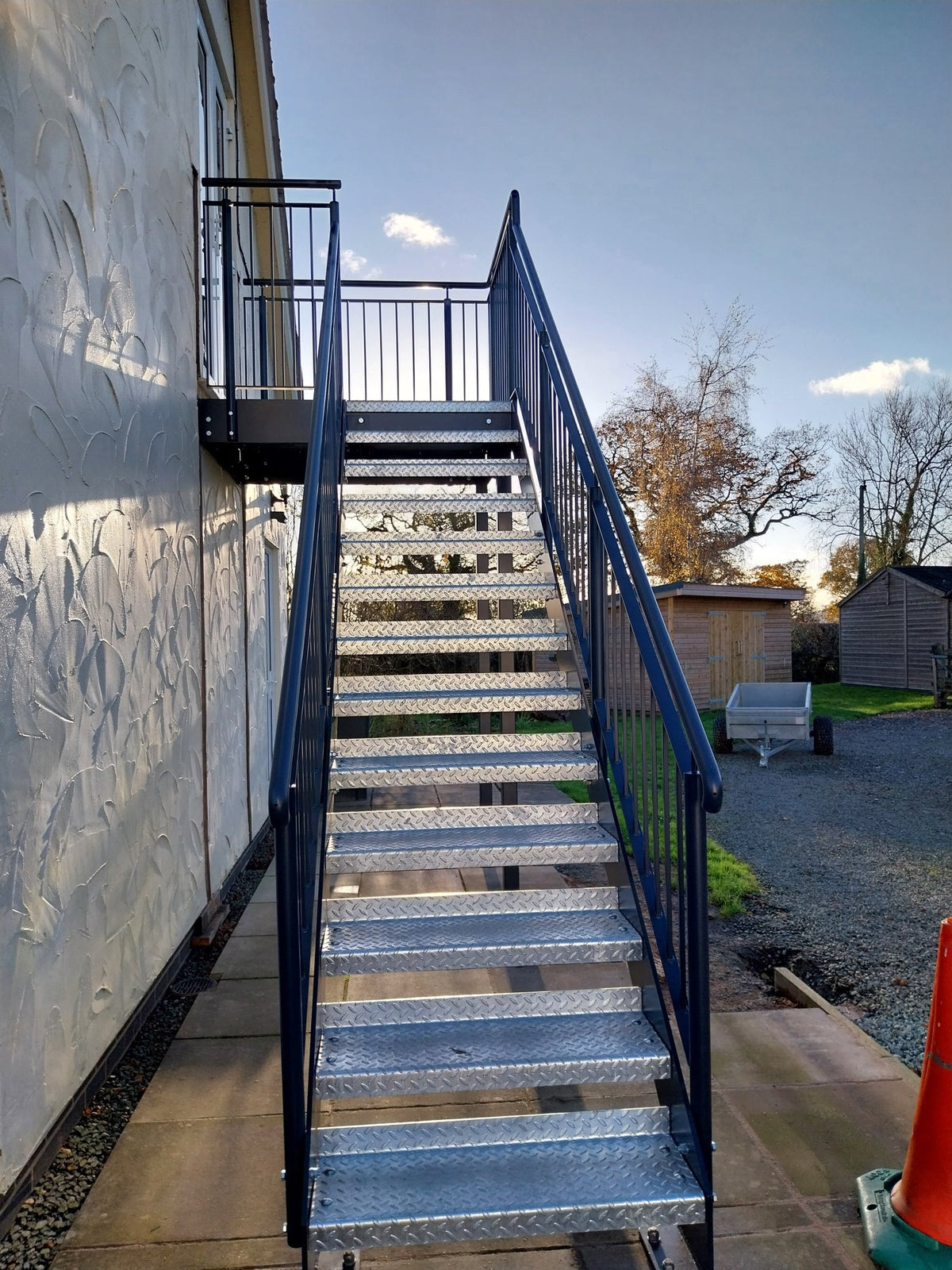 Anti slip treads on a powder coated external access staircase