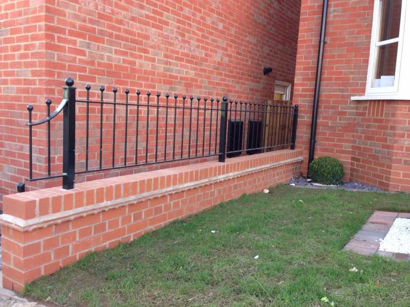 Ball top railing panels between square posts
