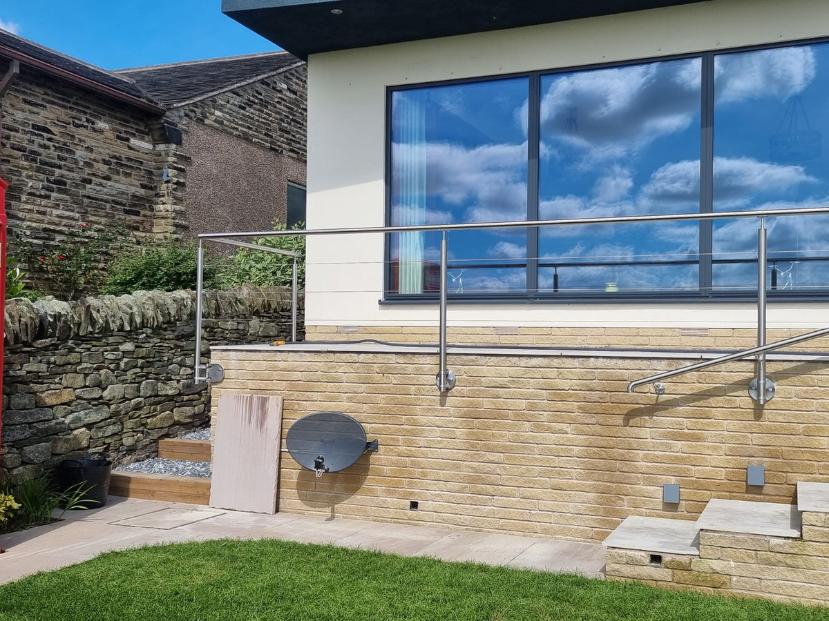 Bespoke stainless wire rope balustrade with handrails