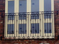 Ornate galvanised steel Juliet balcony with double basket decorative features