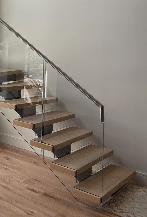 Oak box tread with hidden glass fixing and handrail