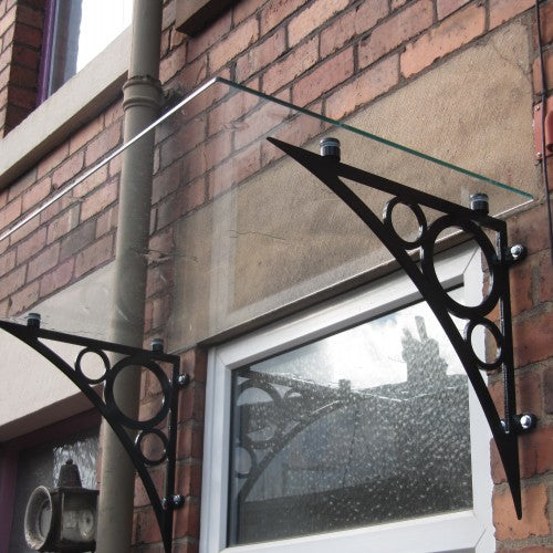 Ornate style glass porch canopy fitted to a house frontage