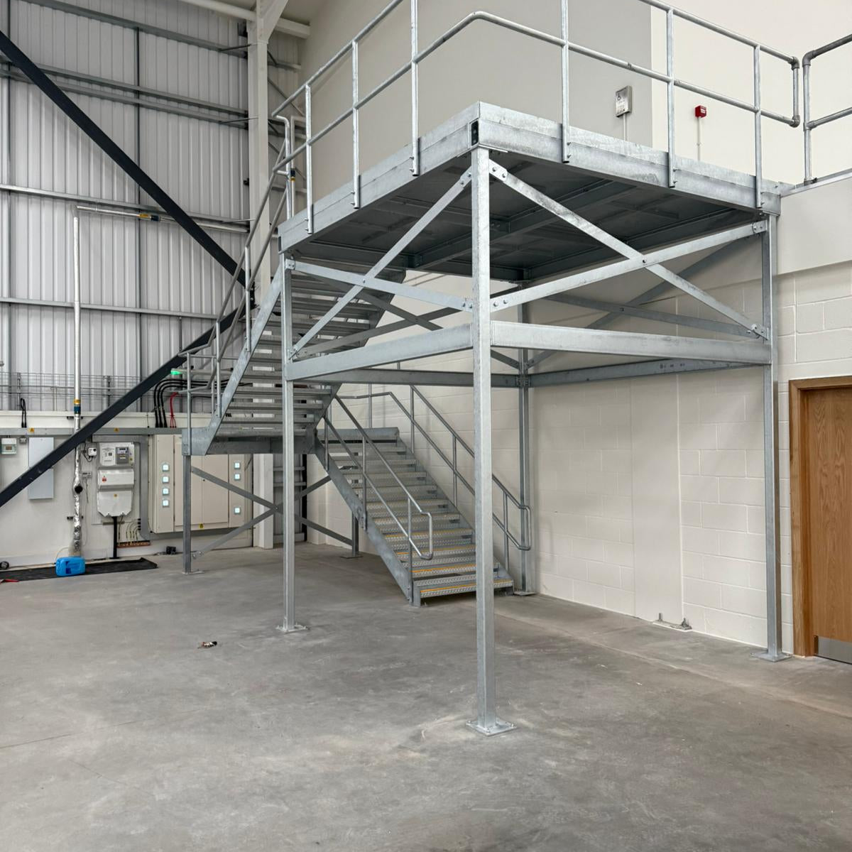 Cross braced commercial steel fire escape staircase