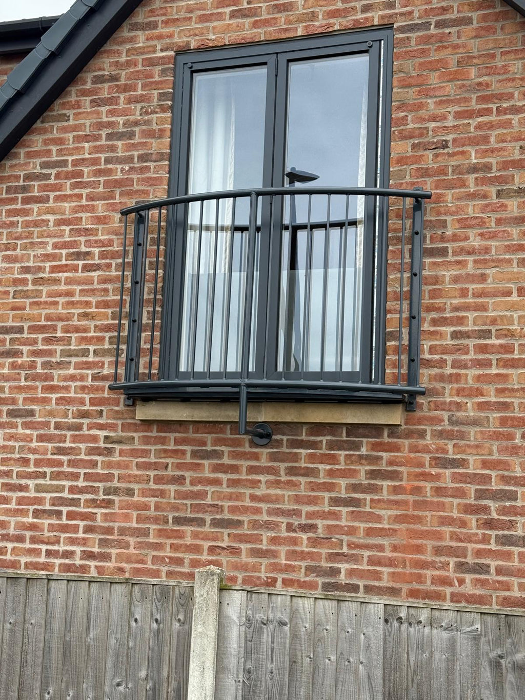 Curved metal Juliet balcony, galvanised and powder coated