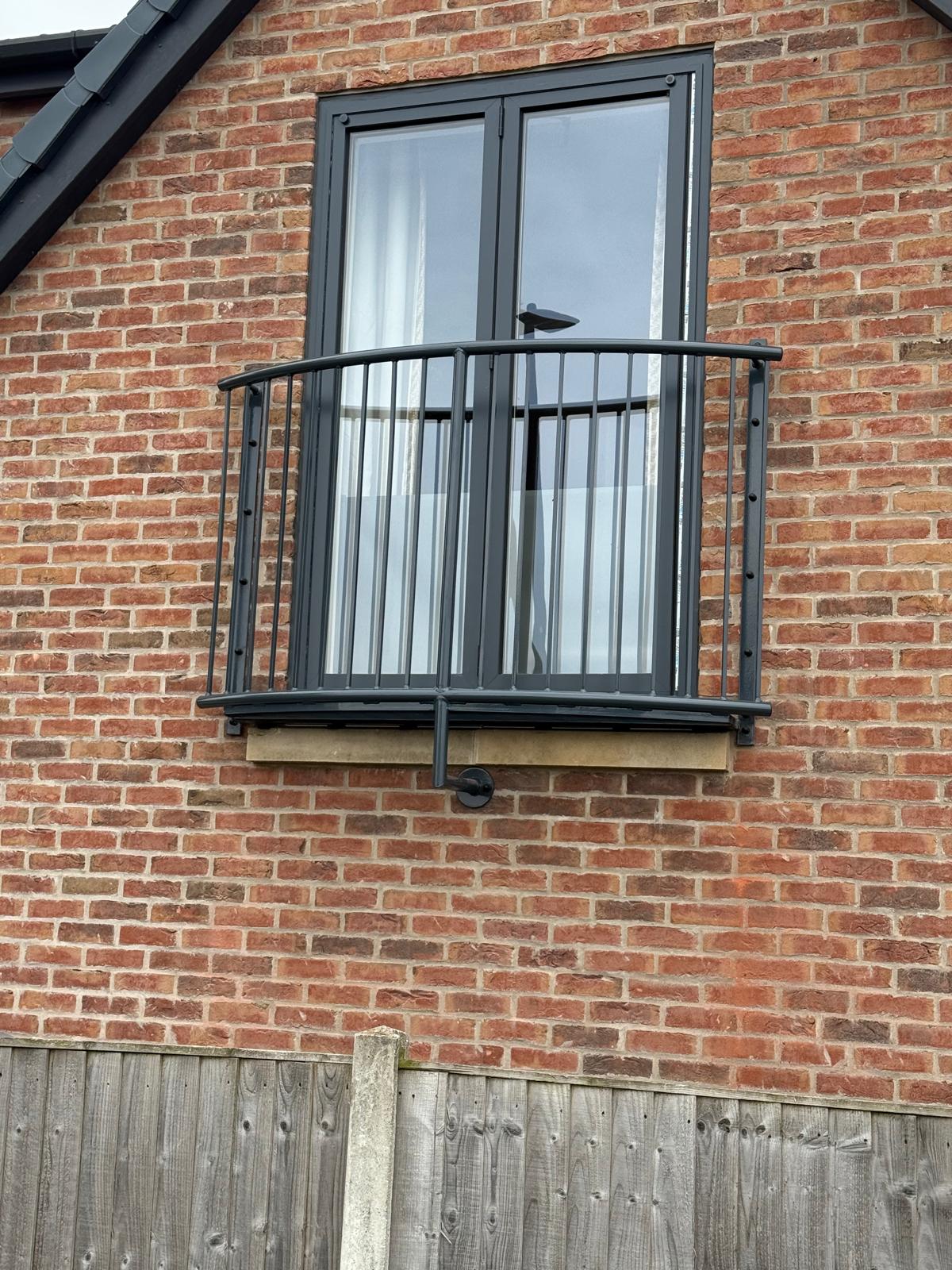 Curved metal Juliet balcony, galvanised and powder coated