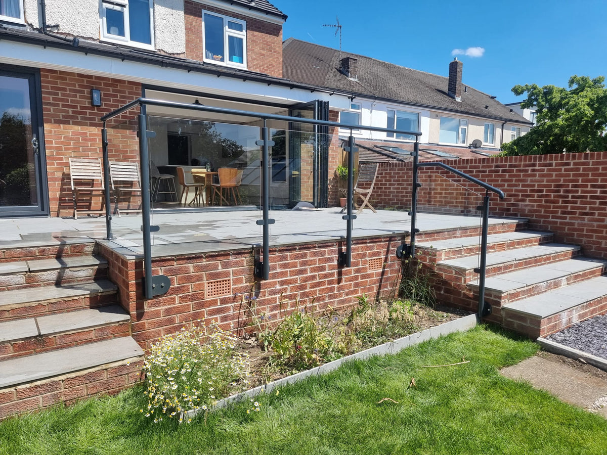 Custom made anthracite grey powder coated glass balcony balustrade
