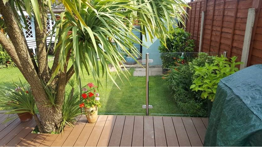 Glass screen to a raised timber deck