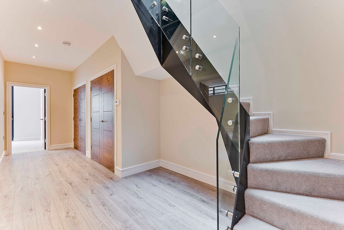 Frameless side mounted glass balustrade