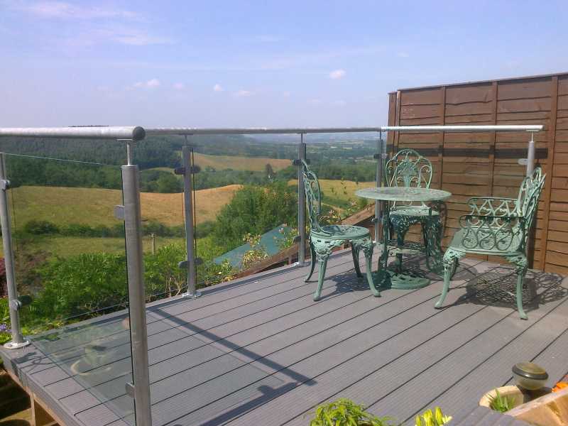 Galvanised steel and glass balustrade to decking