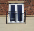 Galvanised steel Juliet balcony with square infill bars and decorative ball tops