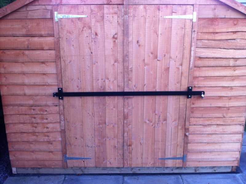 Galvanised steel shed security bar with mounting brackets