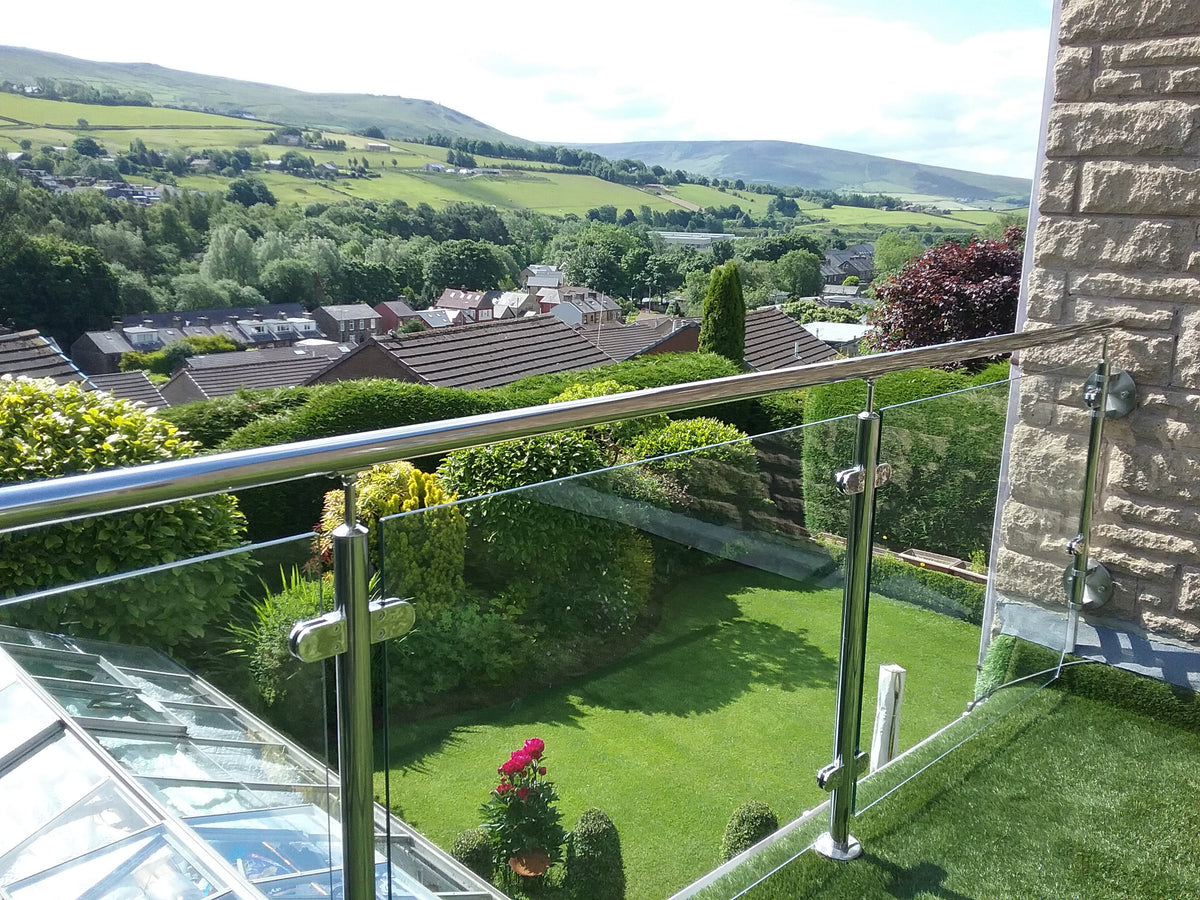 Mirror polished posts with toughened glass infill