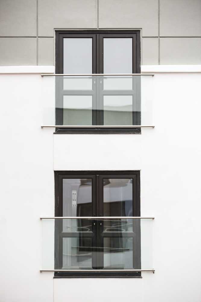 Large glass Juliet balcony with concealed fixings