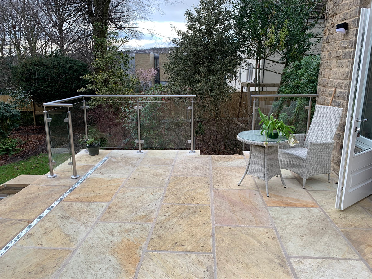 Mirror polished stainless steel and glass balustrade