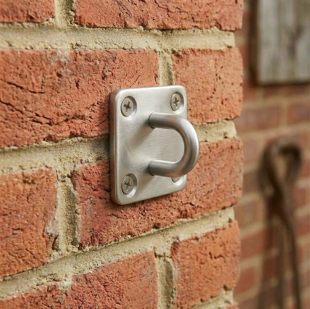 Stainless steel pad eye wall bracket for fixing a shade sail corner to a wall