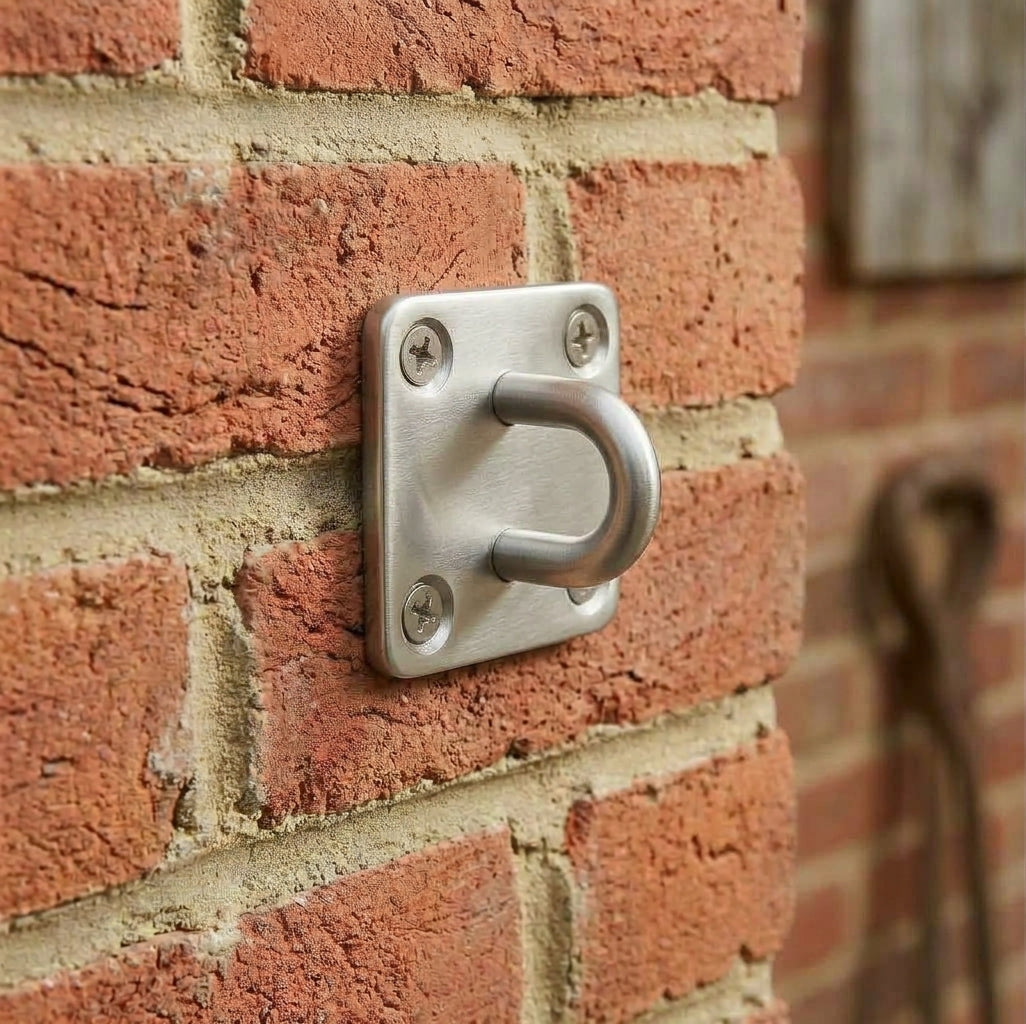 Stainless steel pad eye wall bracket for fixing a shade sail corner to a wall