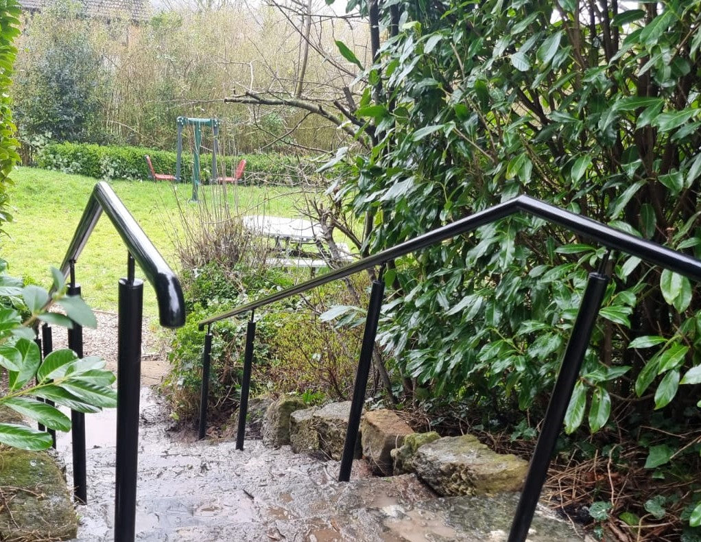 Powder coated metal access handrails on posts