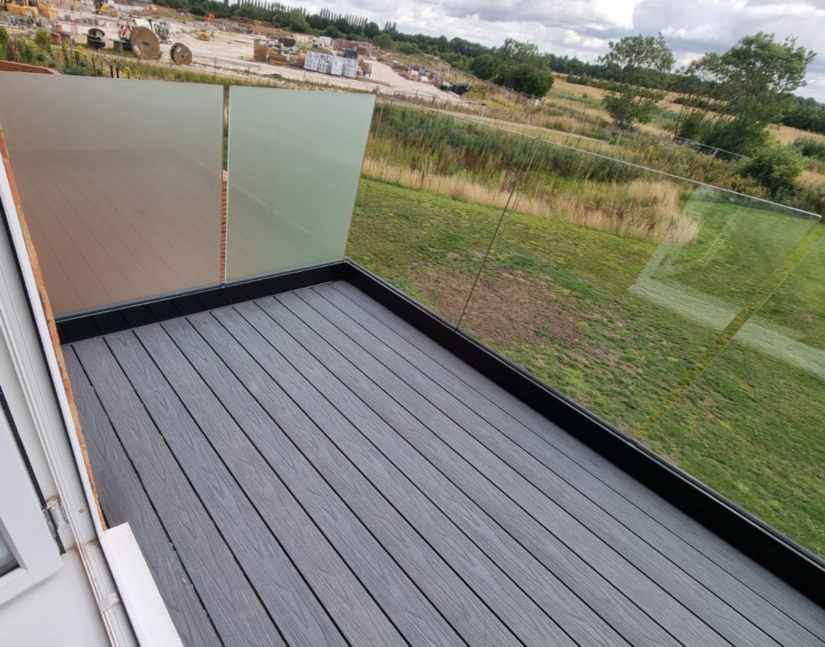 Frosted privacy glass balustrade to a raised deck