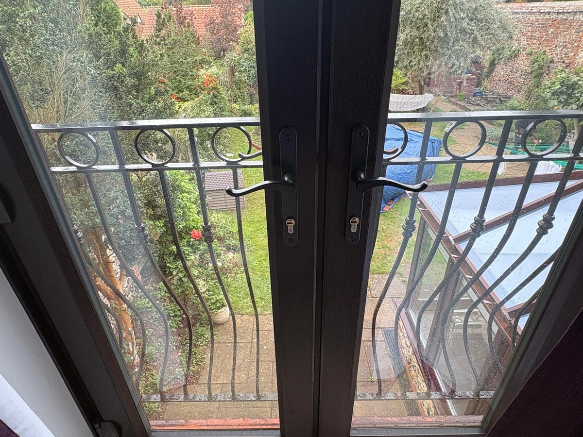 Regency Juliet balcony seen from inside, through the French doors