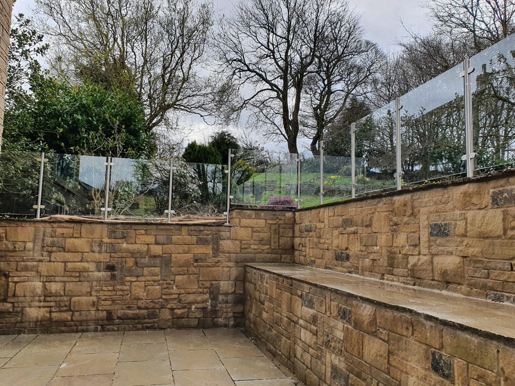 Semi frameless glass balustrade on stainless steel posts in Huddersfield