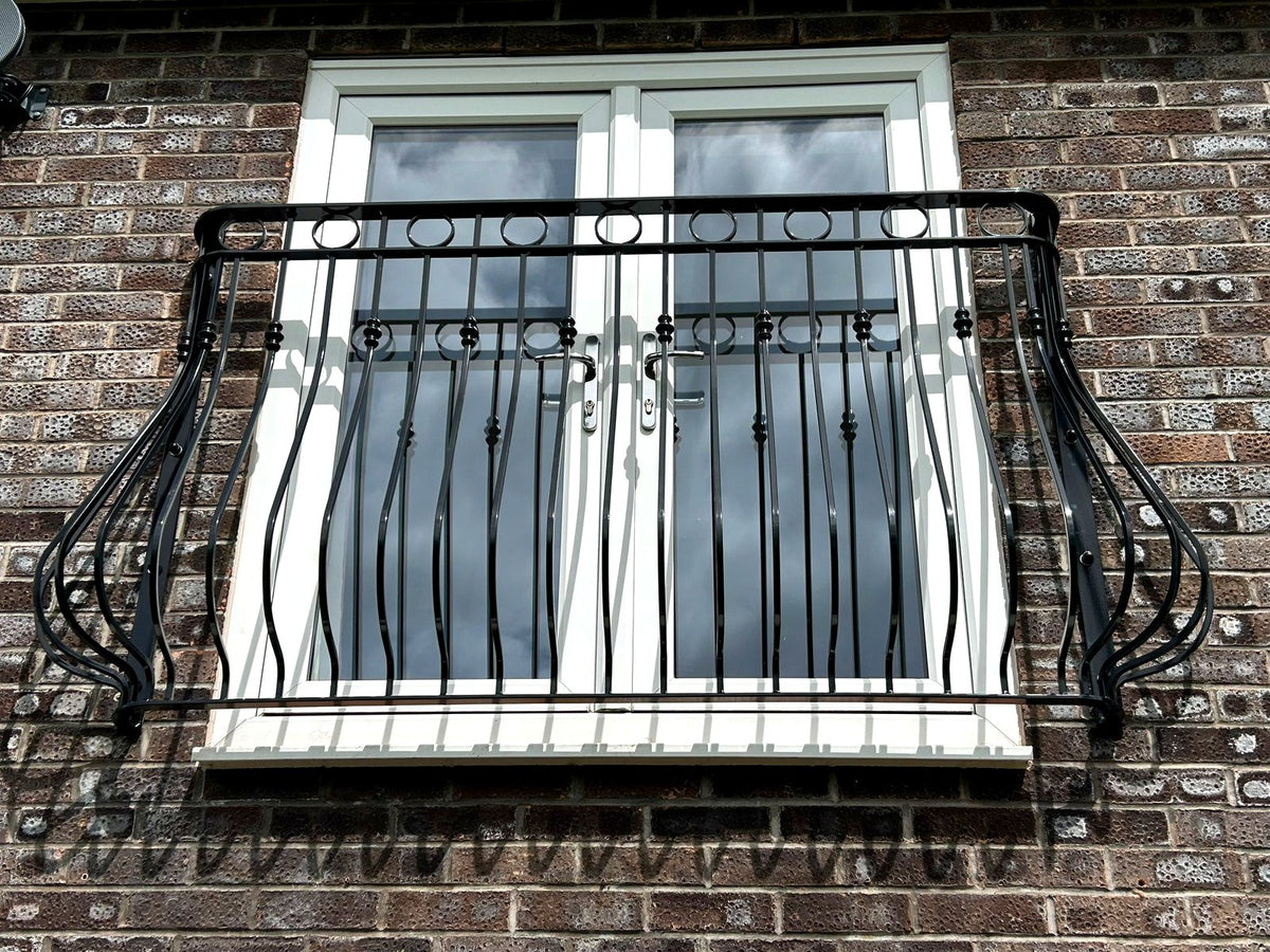 Regency Juliet balcony with rings and collars, supplied and installed