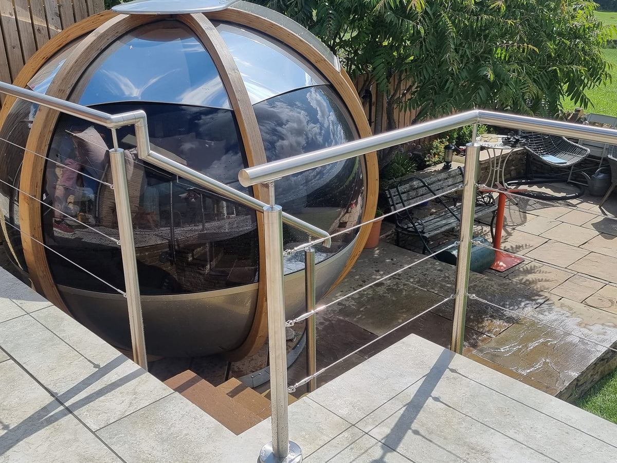 Tensioned stainless steel wire rope balustrade to balcony railings