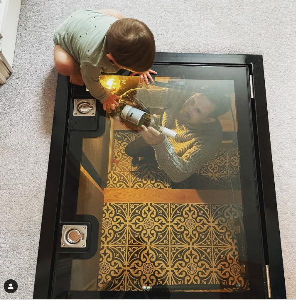 Walk on glass floor hatch above a wine cave